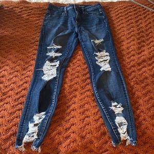 Dark wash ripped skinny jeans